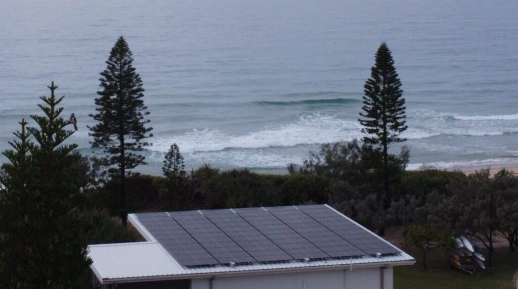 A solar panel on the roof of a house