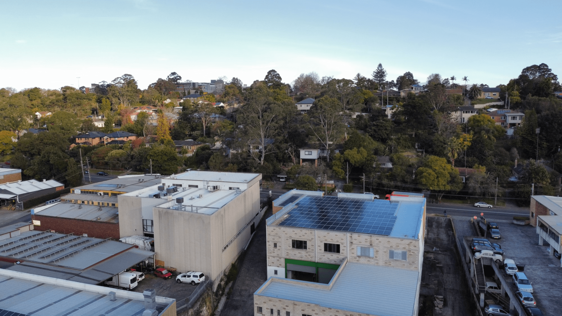 A view of buildings and trees from above.