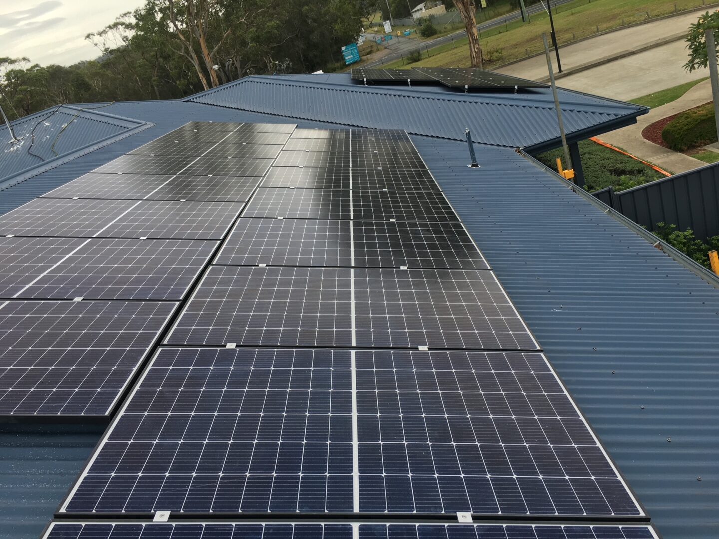 A large solar panel on the side of a building.
