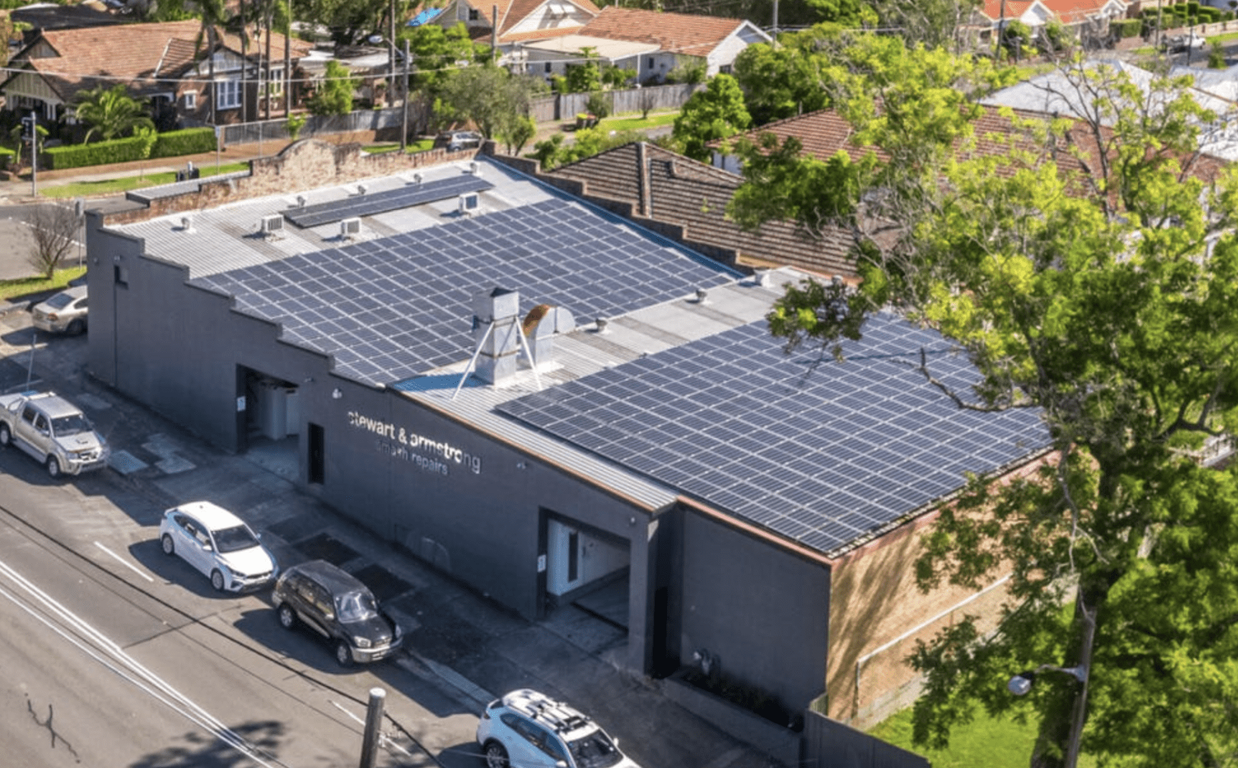 A building with solar panels on the roof.